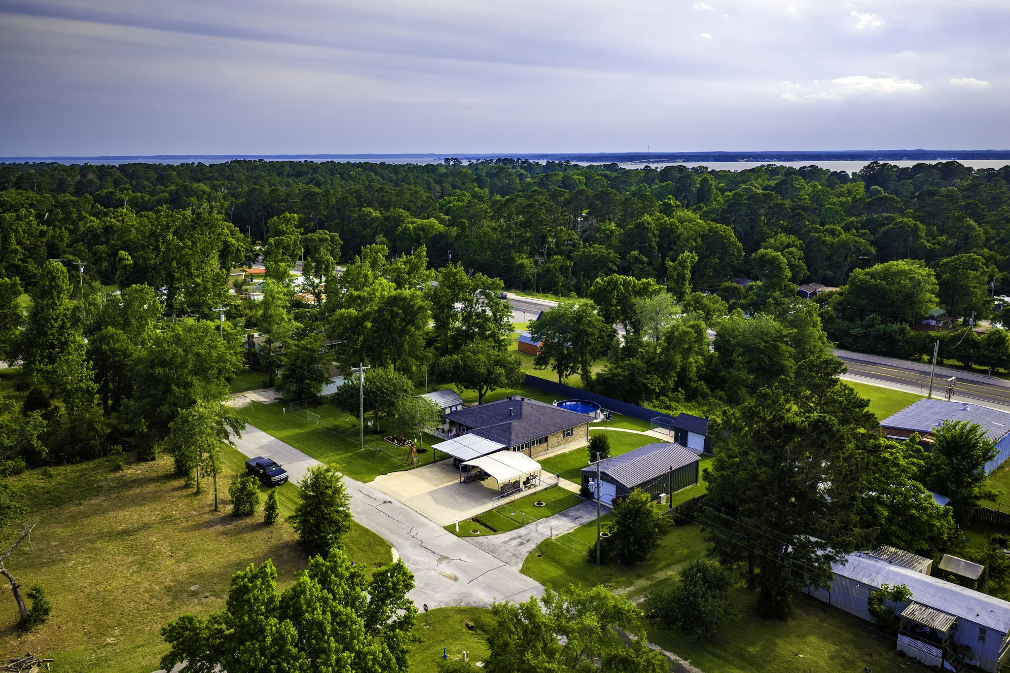 188 Huckleberry Road Onalaska, TX 77360 - Photo 39 of 49 an aerial view of residential houses with outdoor space and swimming pool