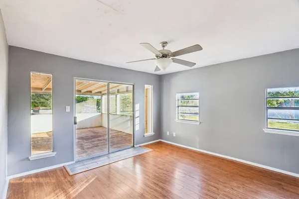 a view of an empty room with a window