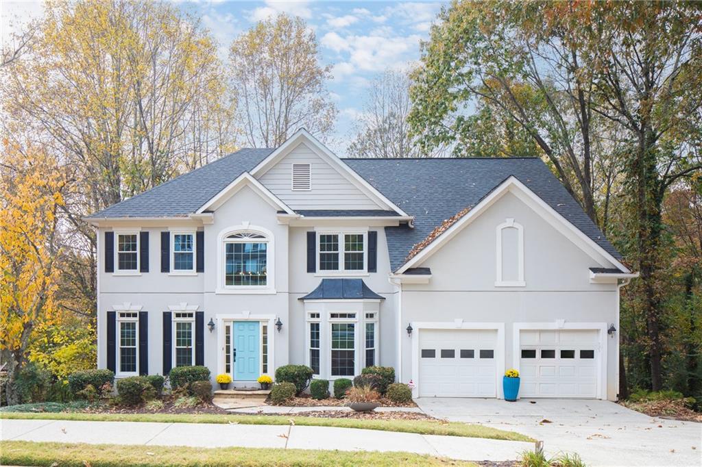 View of front of home featuring a garage