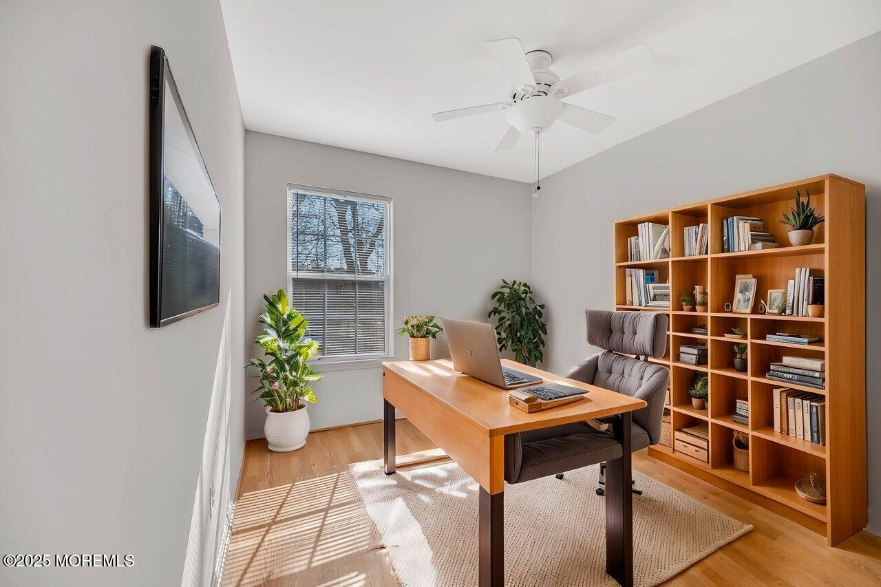 Undisclosed Address Holmdel, NJ 07733 - Photo 22 of 28 a view of a workspace with furniture