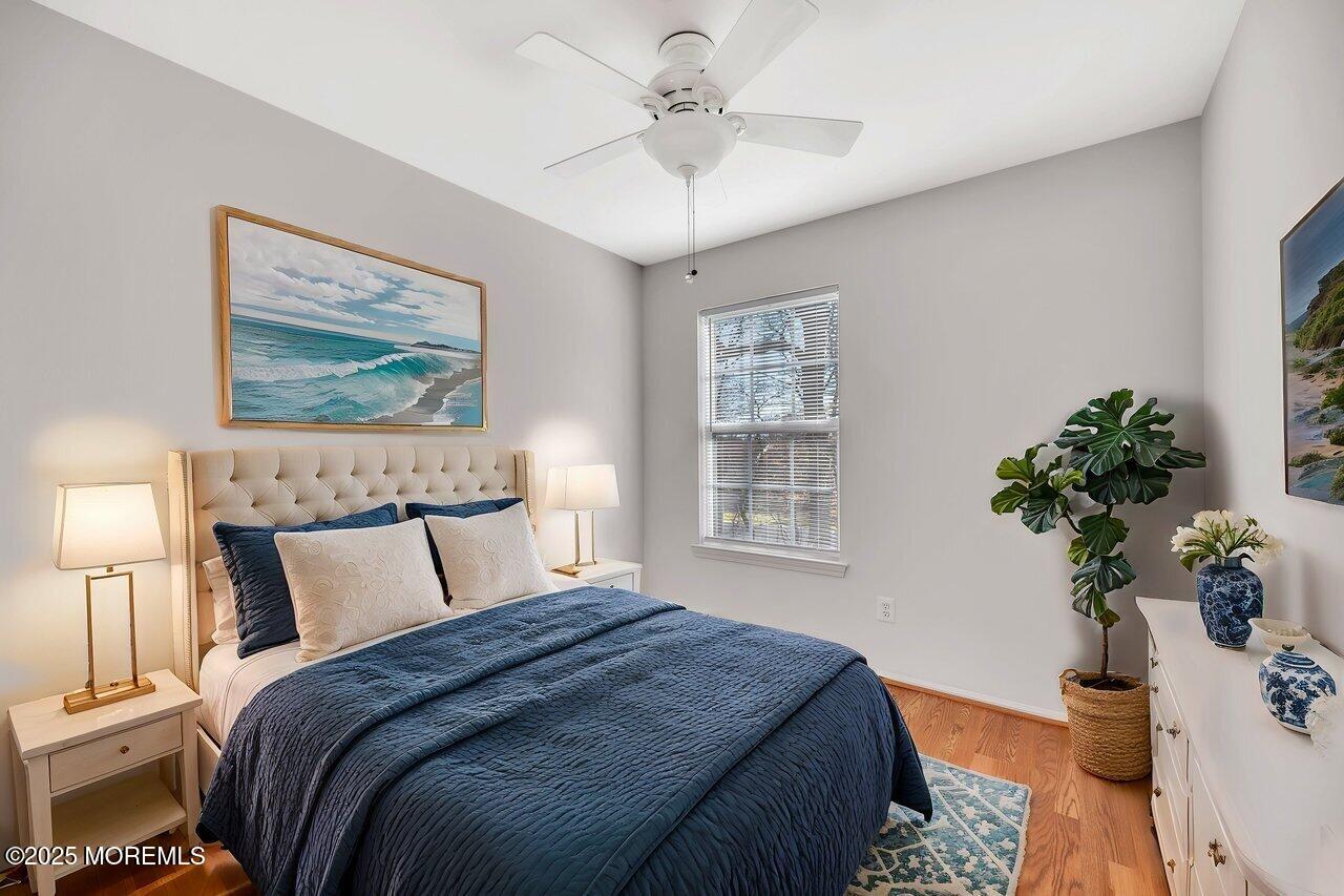 Undisclosed Address Holmdel, NJ 07733 - Photo 24 of 28 a bedroom with bed plant and a window