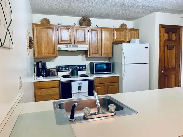 $1,750 | 61 Woodbury Drive, Unit 43, Bristol, NH 03222