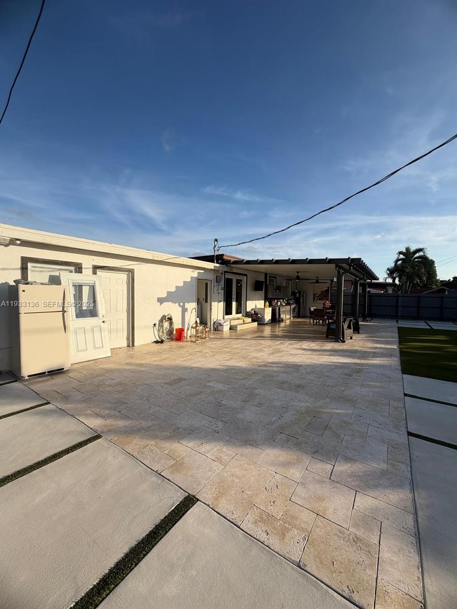 5168 East 8th Lane Hialeah, FL 33013 - Photo 13 of 19 a view of street along with road and cars