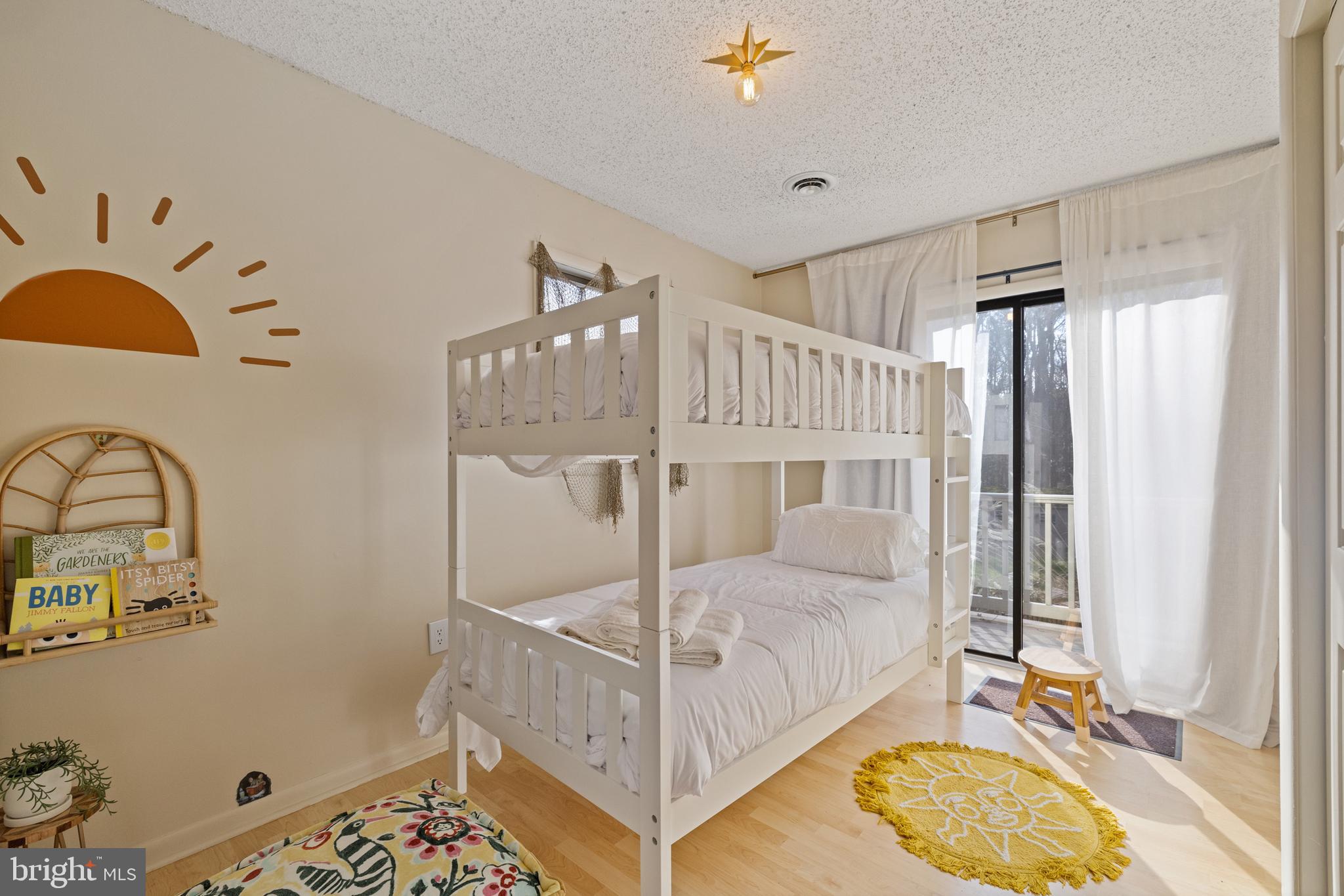 109 Woodmoor Road Stevensville, MD 21666 - Photo 26 of 31 a bedroom with a bed and window