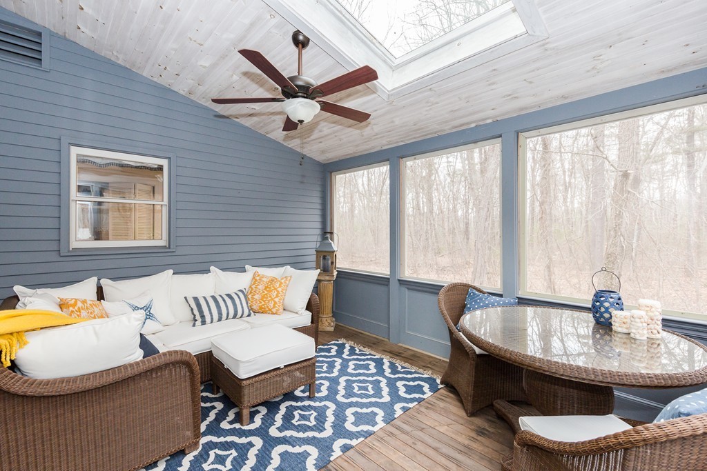 7 Buttonwood Road Amesbury, MA 01913 - Photo 26 of 29 a living room with furniture and a large window