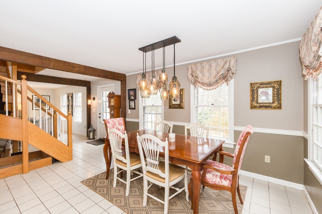7 Buttonwood Road Amesbury, MA 01913 - Photo 8 of 29 a view of a dining room with furniture and chandelier