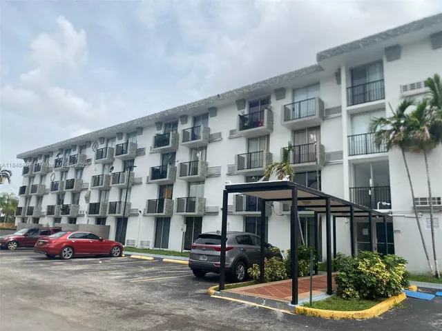 a front view of a building with street view