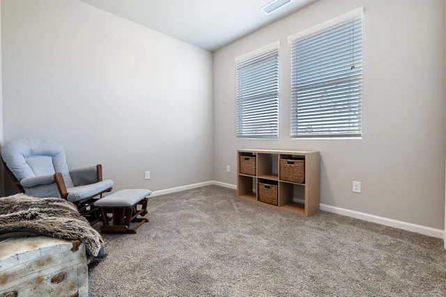 a room with furniture and a window