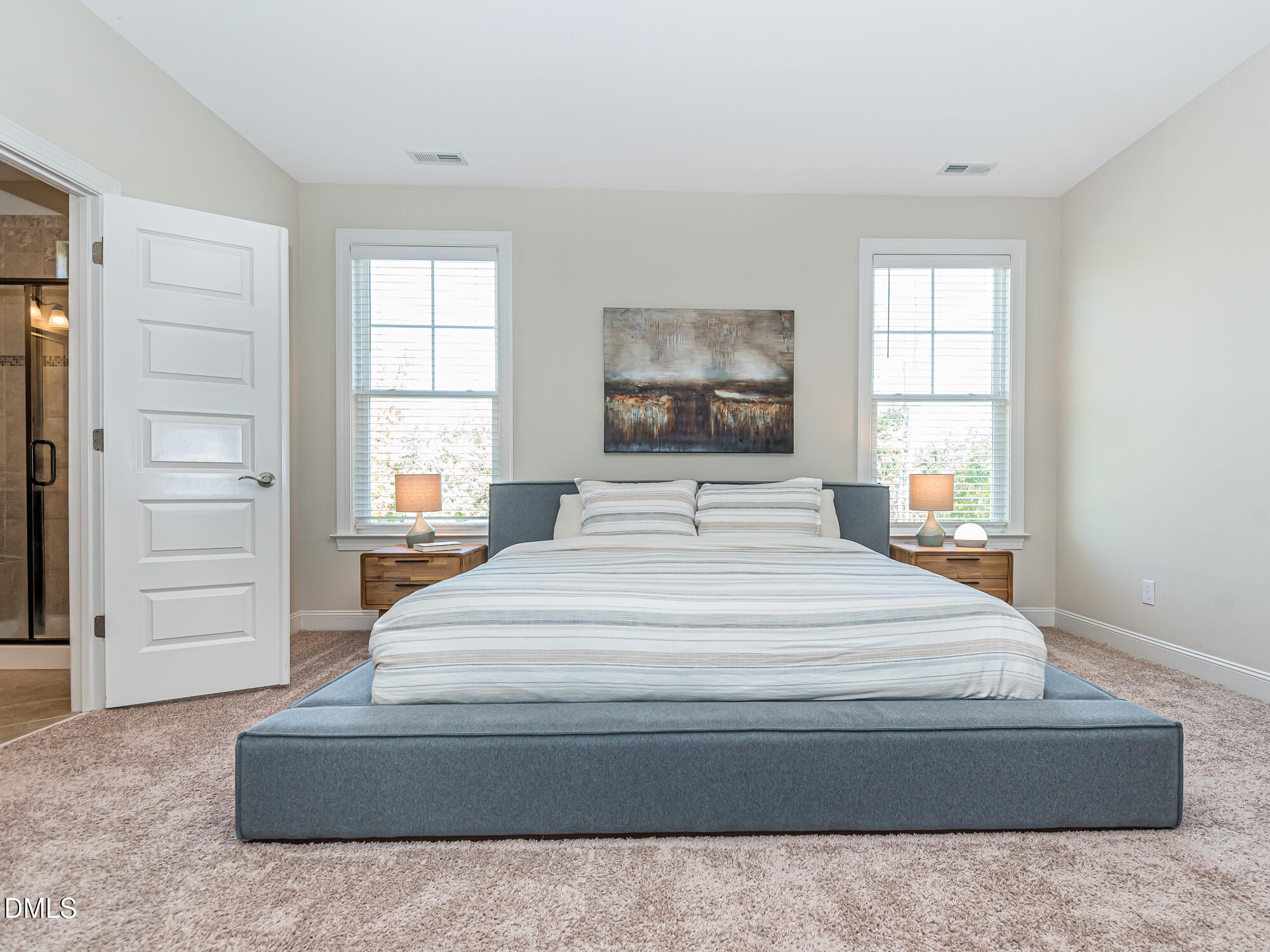 904 Dalton Ridge Place Apex, NC 27523 - Photo 11 of 36 a spacious bedroom with a bed and a window
