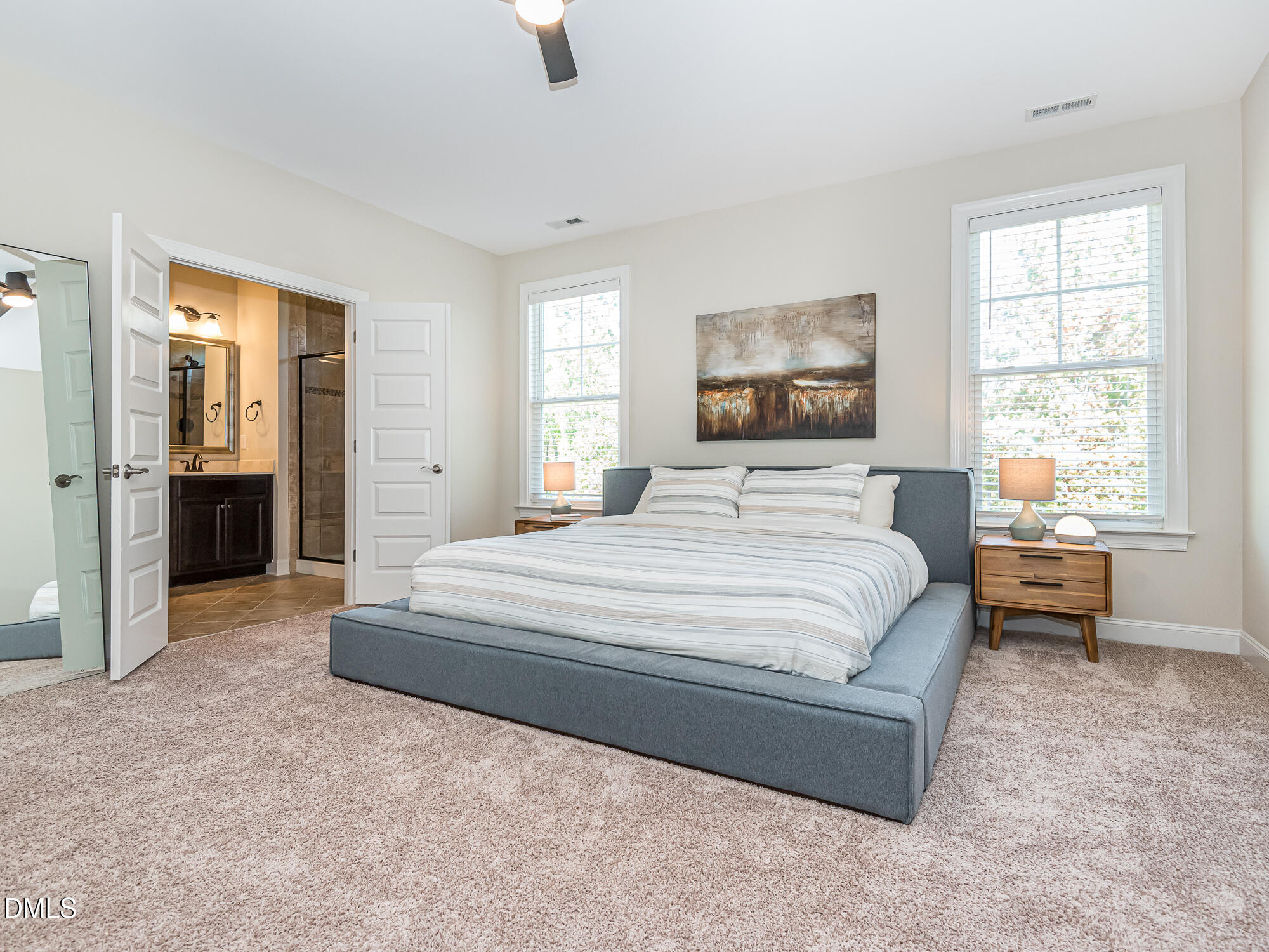 904 Dalton Ridge Place Apex, NC 27523 - Photo 12 of 36 a bedroom with a bed and a window