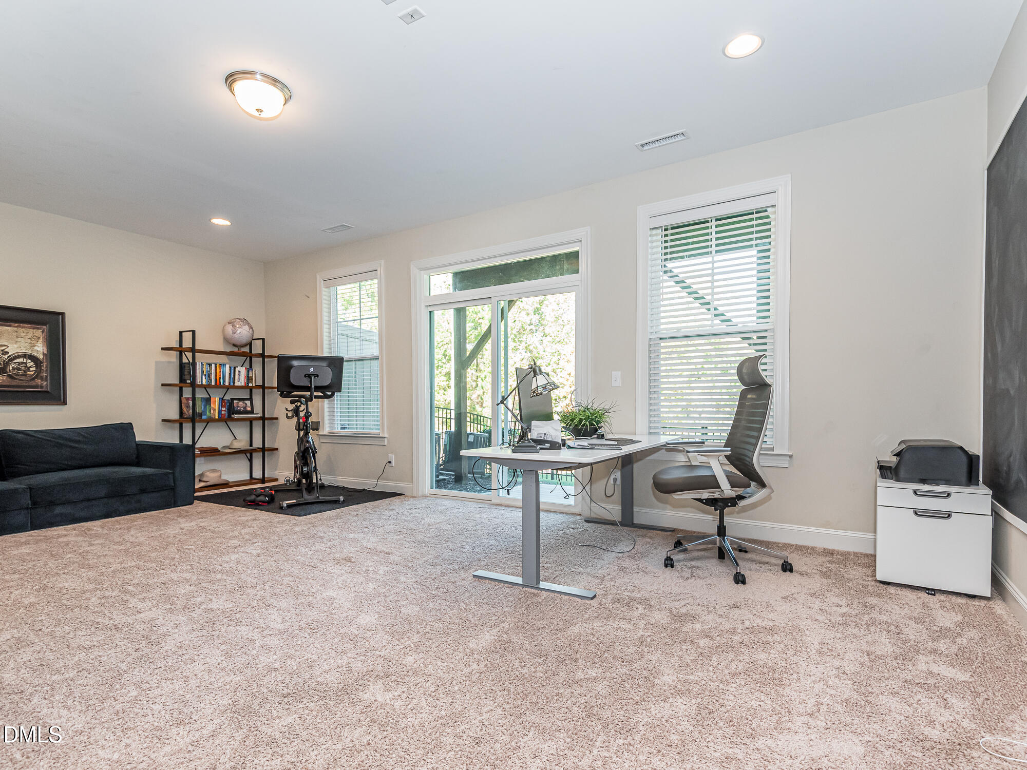 904 Dalton Ridge Place Apex, NC 27523 - Photo 20 of 36 a view of a livingroom with workspace and a window