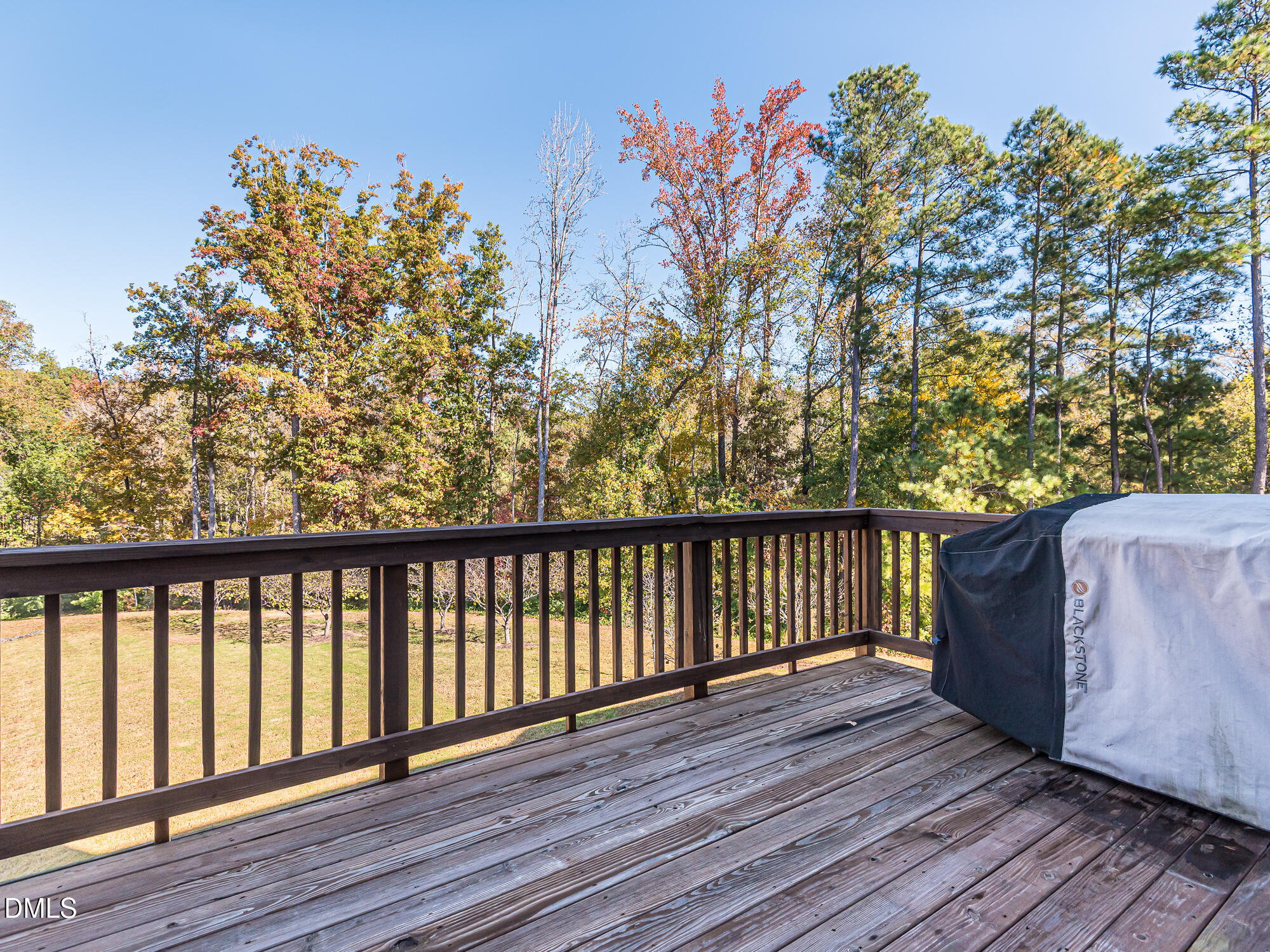 904 Dalton Ridge Place Apex, NC 27523 - Photo 25 of 36 a balcony with wooden floor and fence