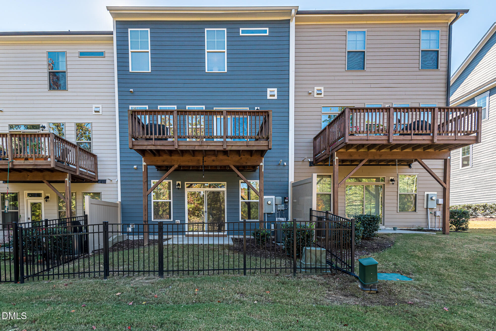 904 Dalton Ridge Place Apex, NC 27523 - Photo 27 of 36 a front view of a houses on the yard and deck
