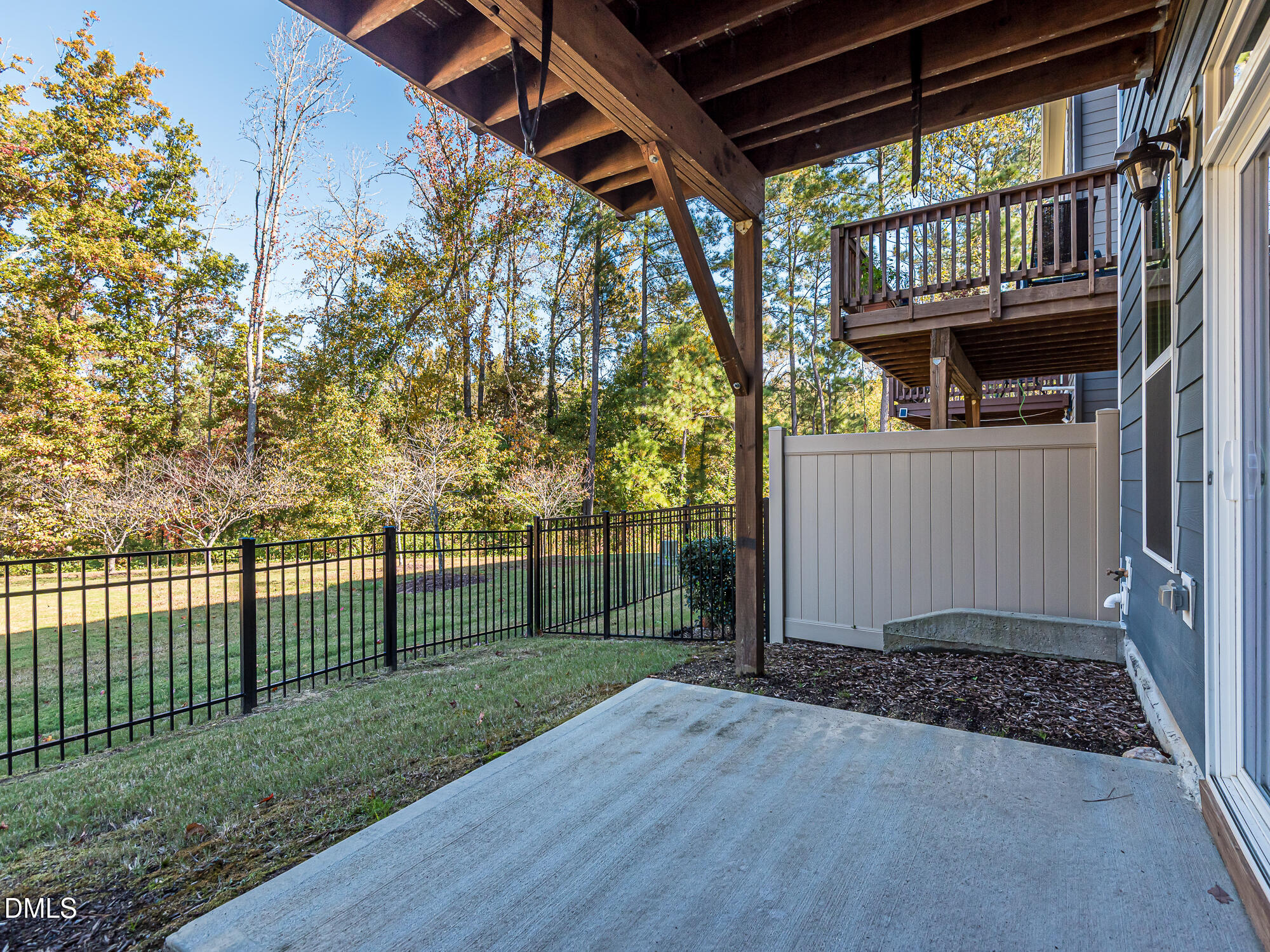 904 Dalton Ridge Place Apex, NC 27523 - Photo 30 of 36 a view of a porch with a small yard