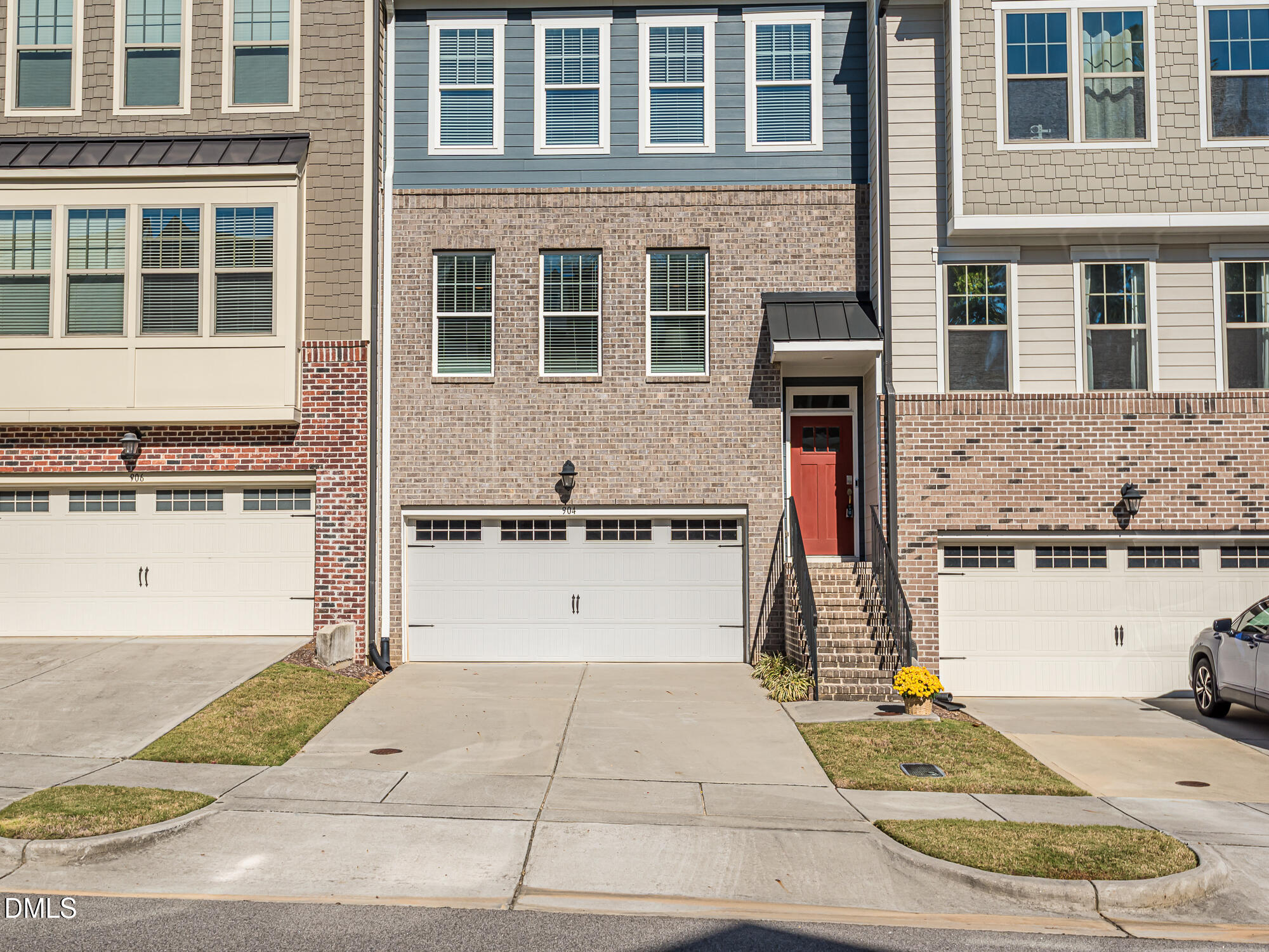 904 Dalton Ridge Place Apex, NC 27523 - Photo 32 of 36 a view of a building with many windows