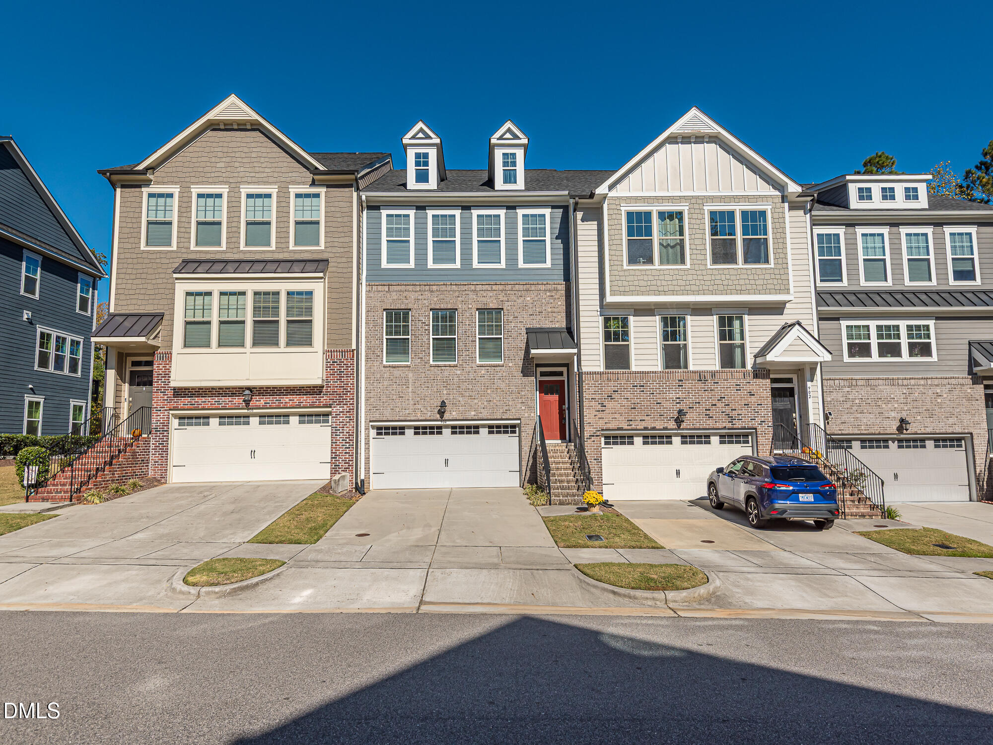904 Dalton Ridge Place Apex, NC 27523 - Photo 33 of 36 a front view of a residential apartment building
