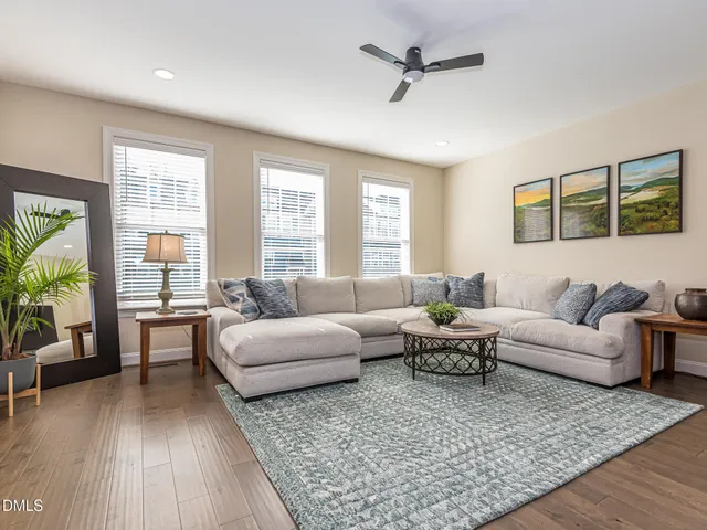 a kitchen with granite countertop cabinets a sink and stainless steel appliances