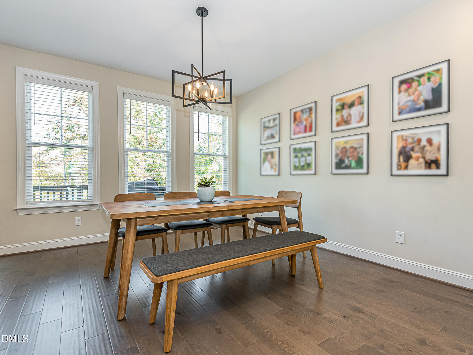 904 Dalton Ridge Place Apex, NC 27523 - Photo 8 of 36 a dining room with furniture window and wooden floor