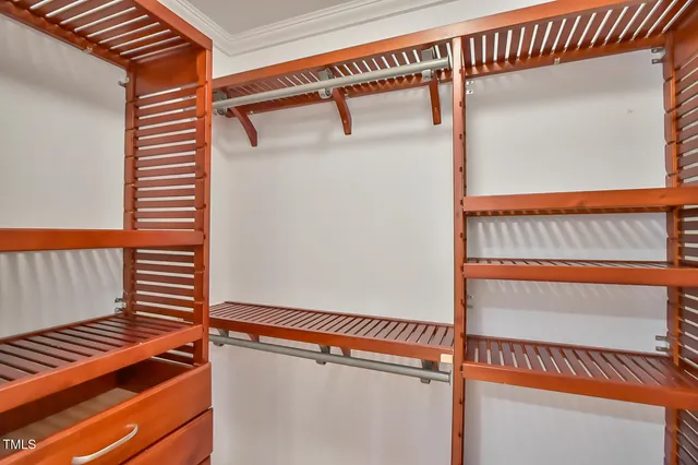 a view of a room with wooden walls