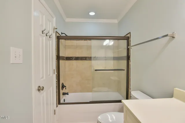 a bathroom with a shower and a tub