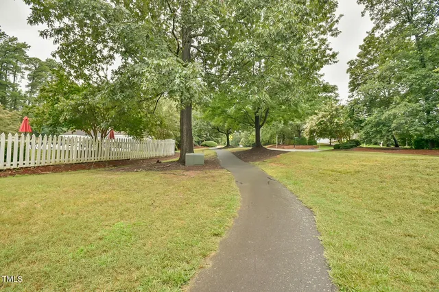 a view of a swimming pool and an outdoor space
