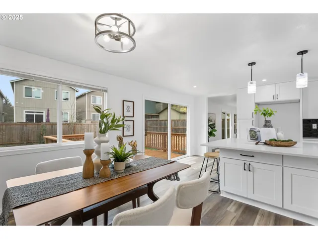 a view of kitchen island sink and living room