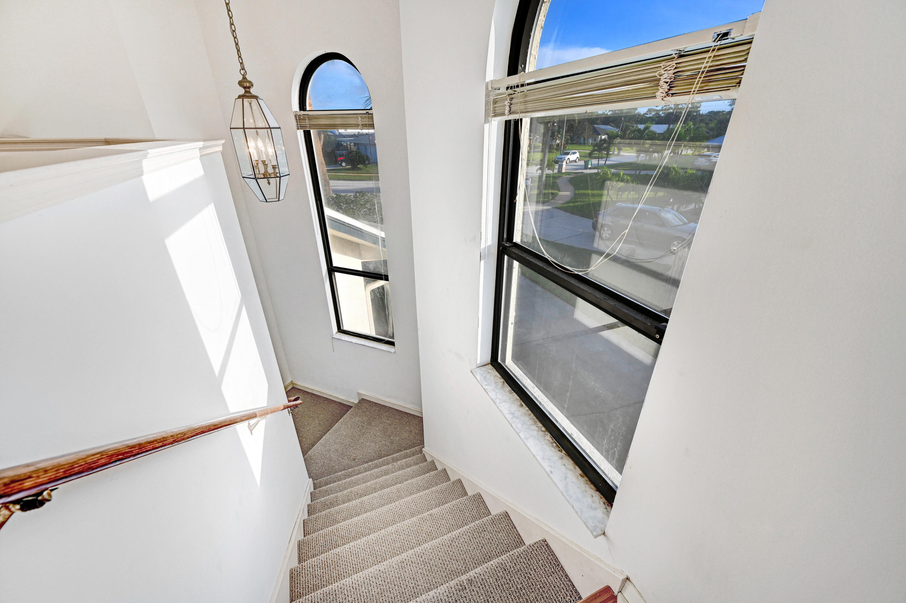 3 Inwood Way Indian Harbour Beach, FL 32937 - Photo 20 of 35 a view of balcony with wooden floor and door