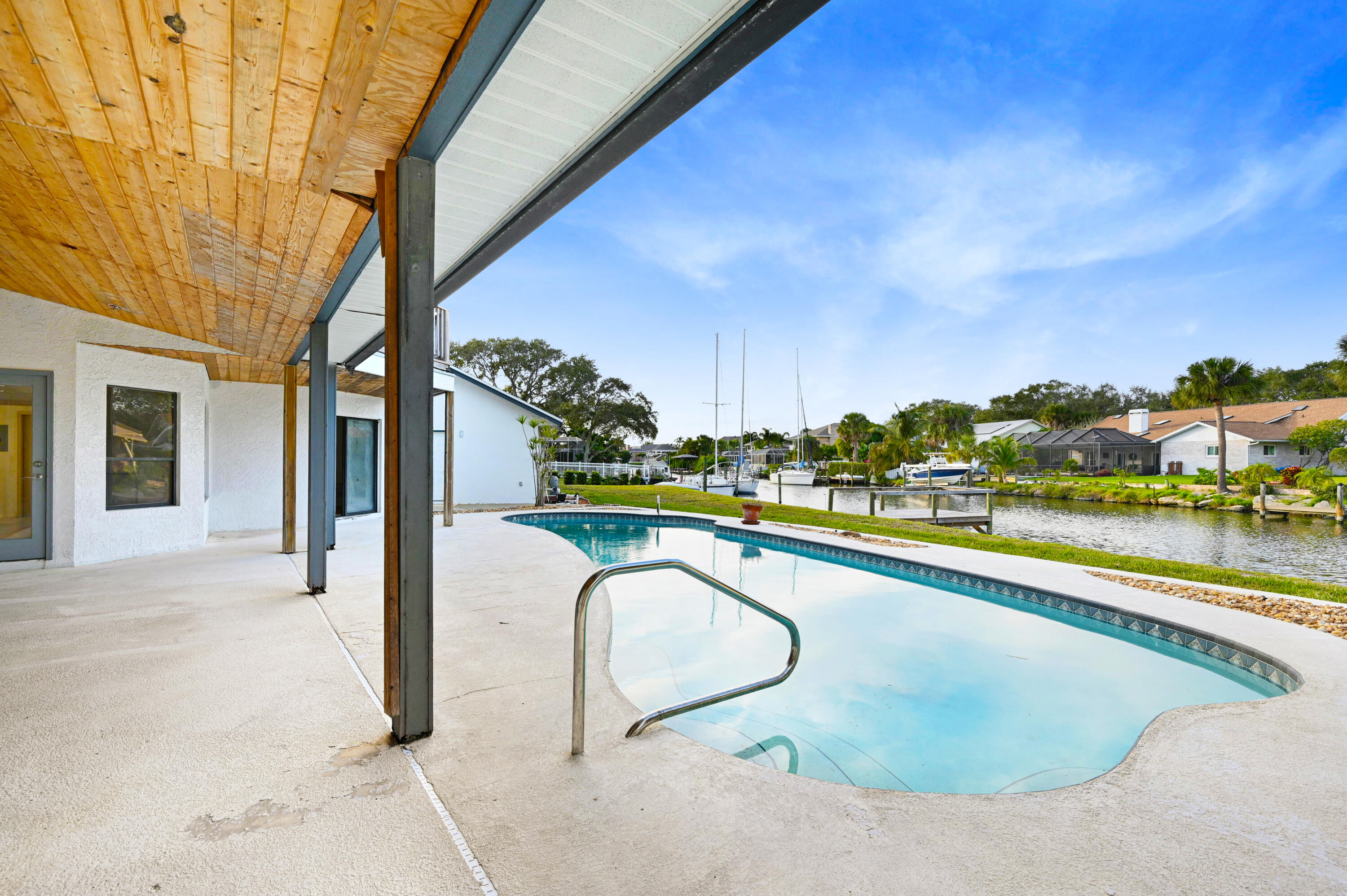 3 Inwood Way Indian Harbour Beach, FL 32937 - Photo 28 of 35 a view of swimming pool from a balcony
