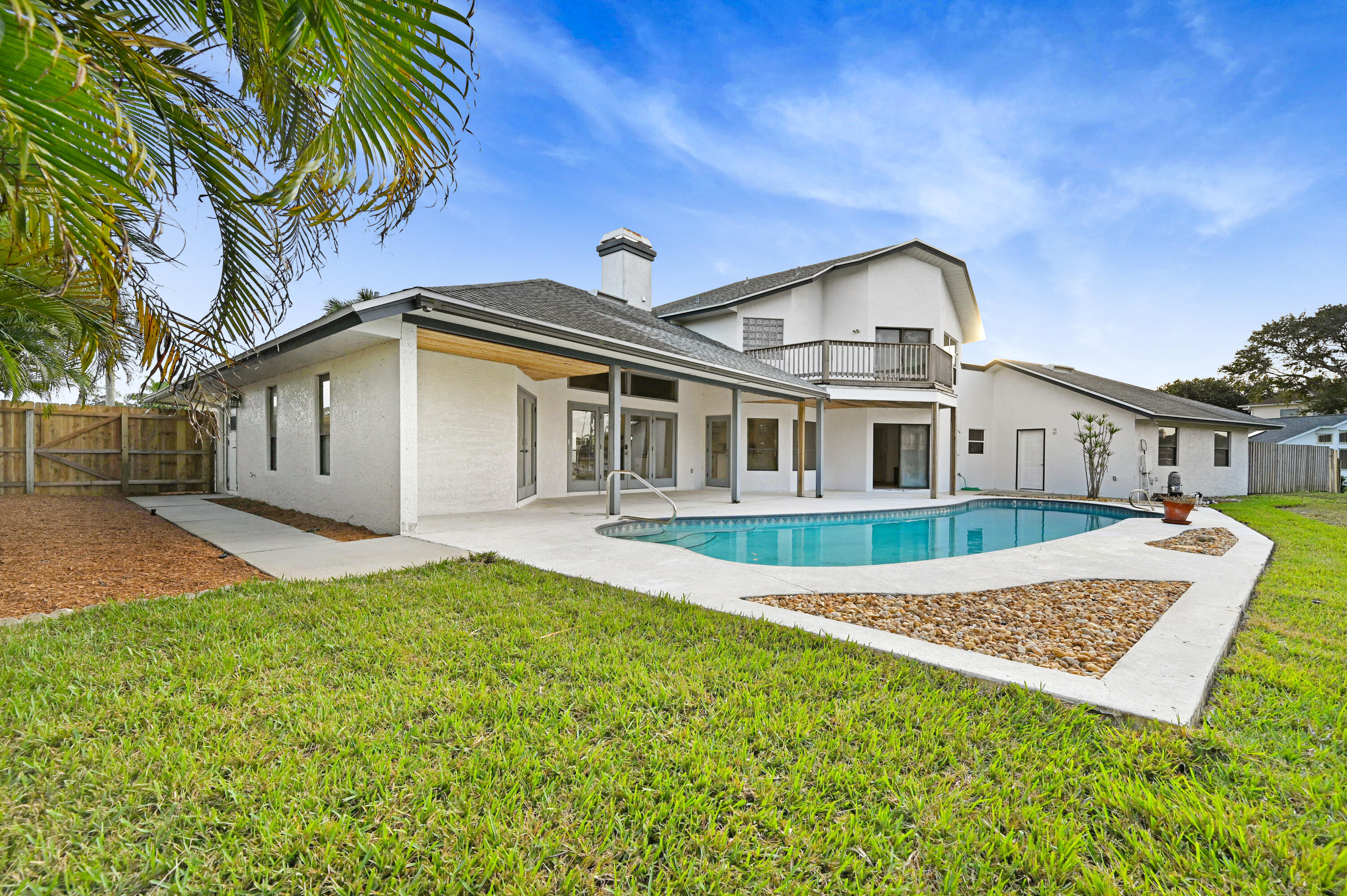 3 Inwood Way Indian Harbour Beach, FL 32937 - Photo 29 of 35 a front view of a house with a yard
