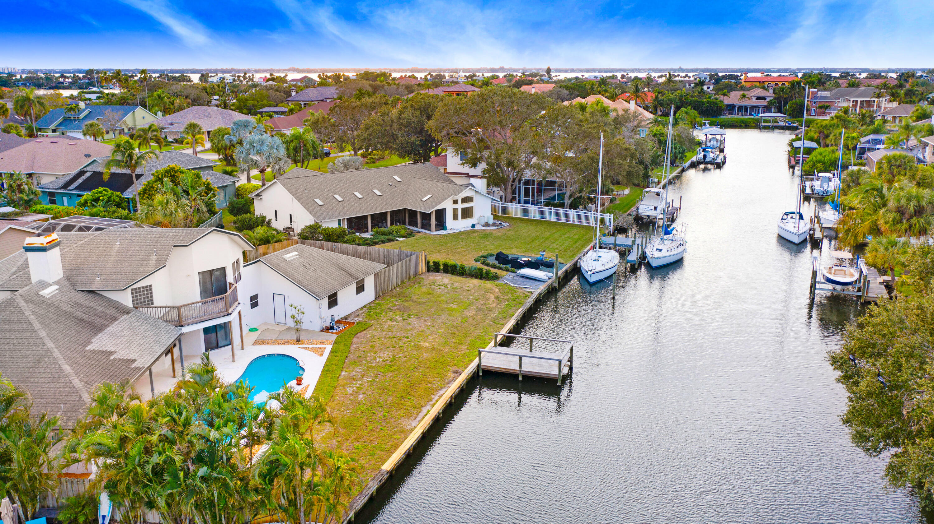 3 Inwood Way Indian Harbour Beach, FL 32937 - Photo 31 of 35 an aerial view of residential houses with outdoor space and river view