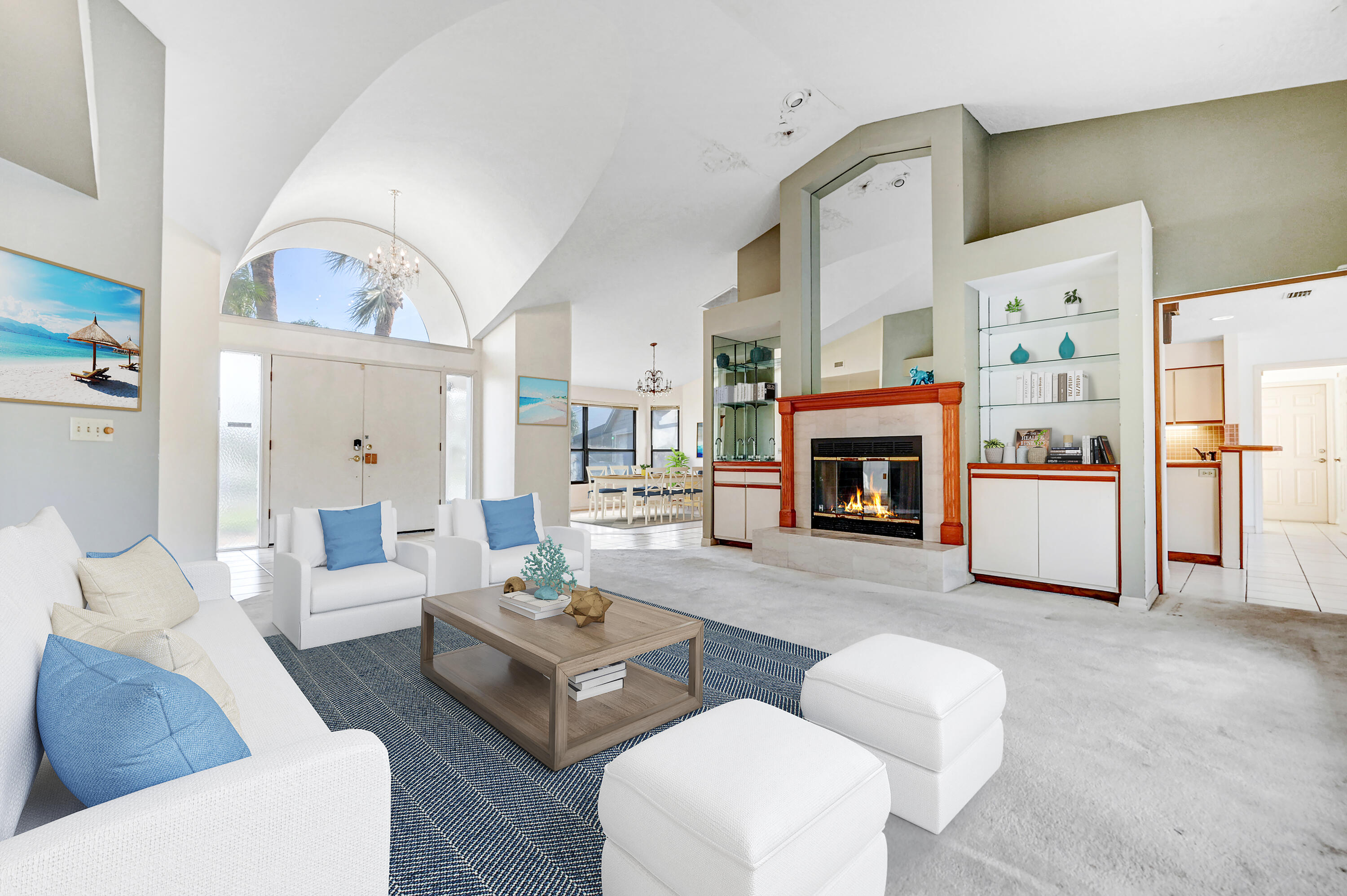 3 Inwood Way Indian Harbour Beach, FL 32937 - Photo 5 of 35 a living room with furniture and a fireplace