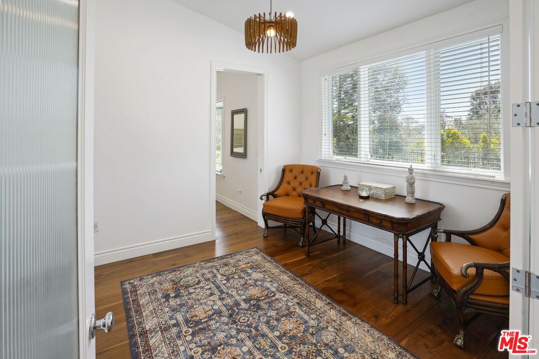 6544 Wandermere Road Malibu, CA 90265 - Photo 14 of 36 a living room with furniture and a window