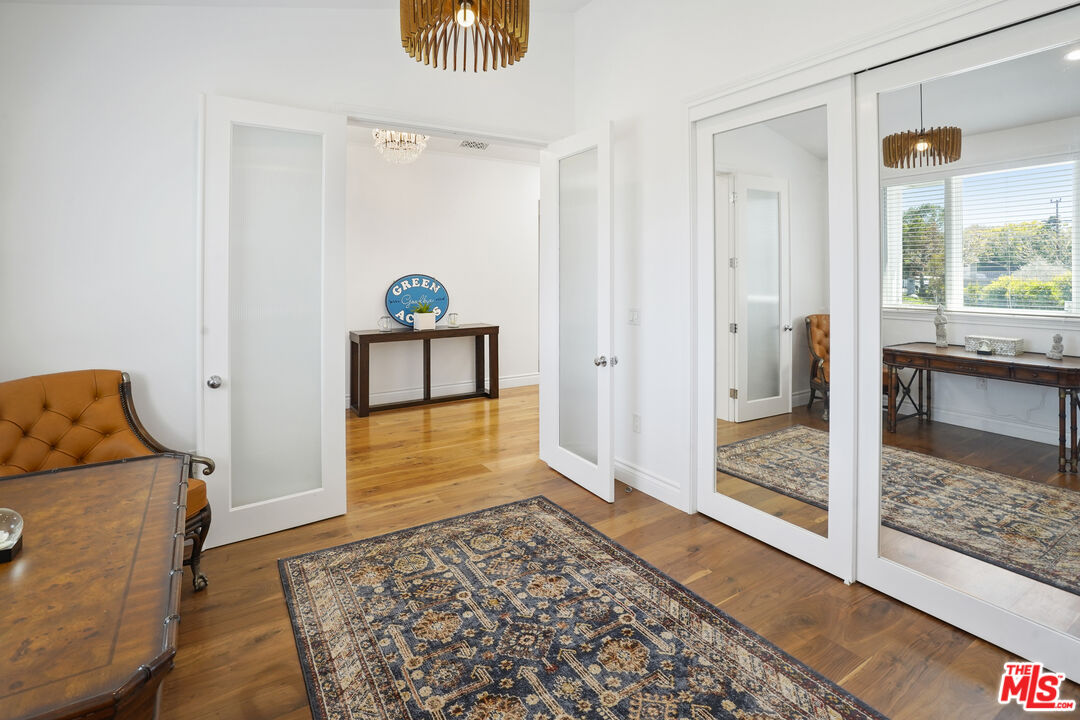 6544 Wandermere Road Malibu, CA 90265 - Photo 15 of 36 a living room with a couch and a rug
