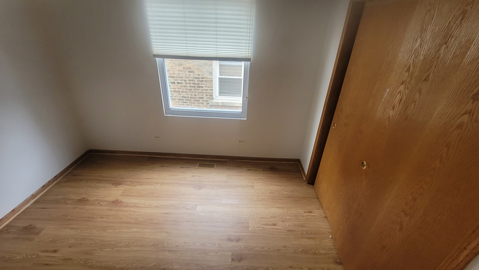 2977 North Lawndale Avenue, Unit 2 Chicago, IL 60618 - Photo 11 of 15 an empty room with a window