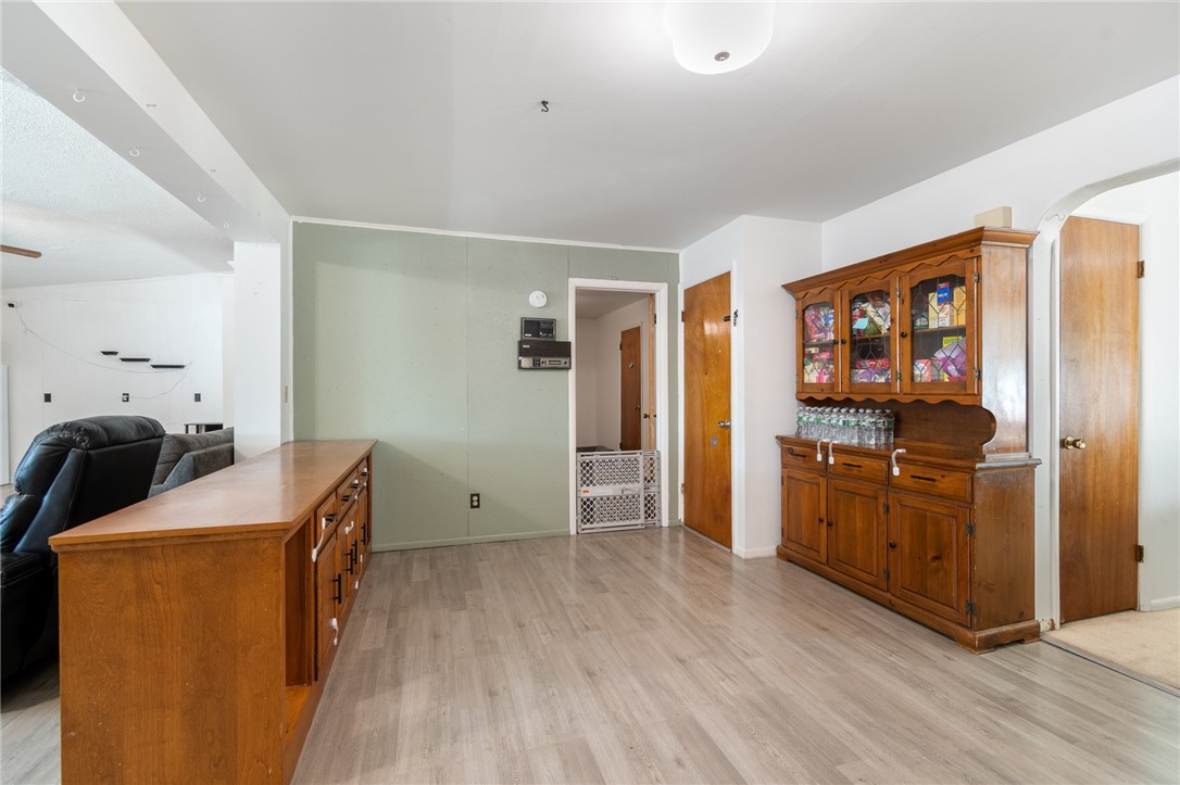 35 Banker Place Rochester, NY 14616 - Photo 10 of 45 This dining area opens to the first floor primary suite - lots of storage here too!