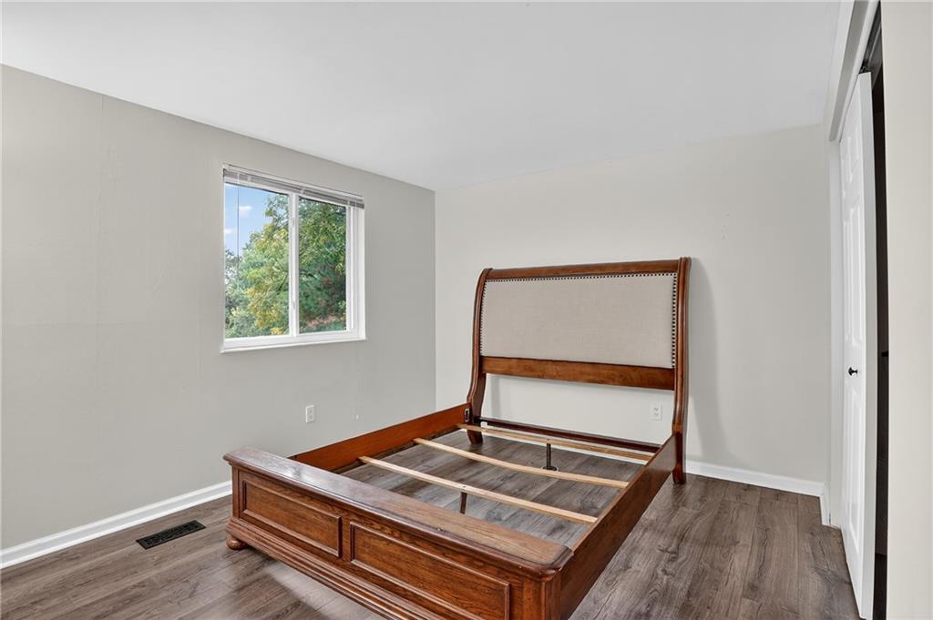 1240 Manor Drive Upper St. Clair, PA 15241 - Photo 16 of 24 a room with chair and wooden floor
