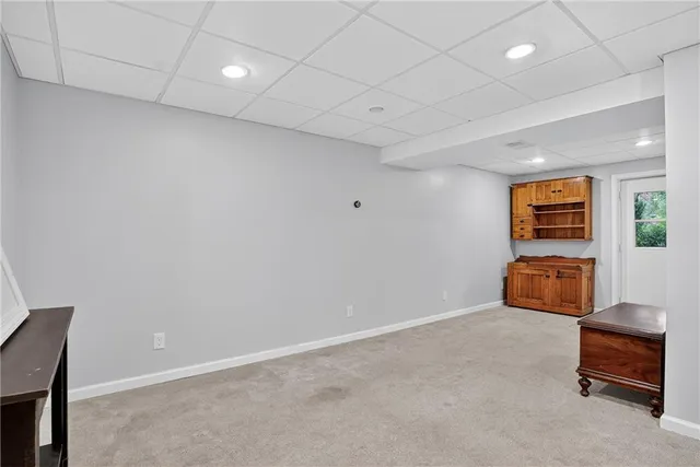 a room with furniture and a window