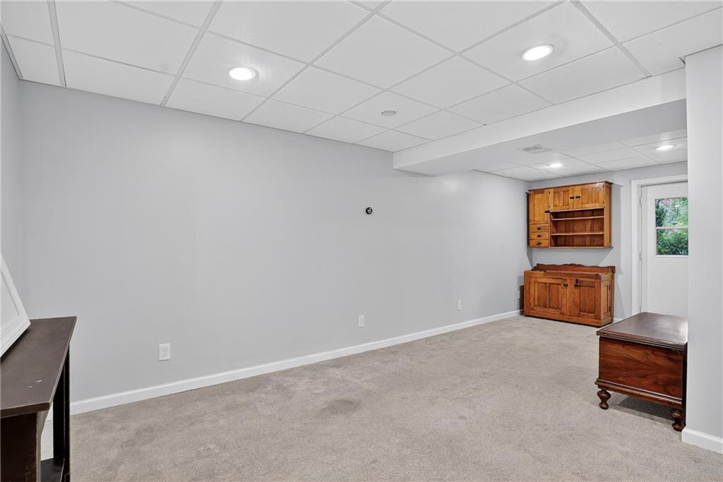 1240 Manor Drive Upper St. Clair, PA 15241 - Photo 20 of 24 a room with furniture and a window