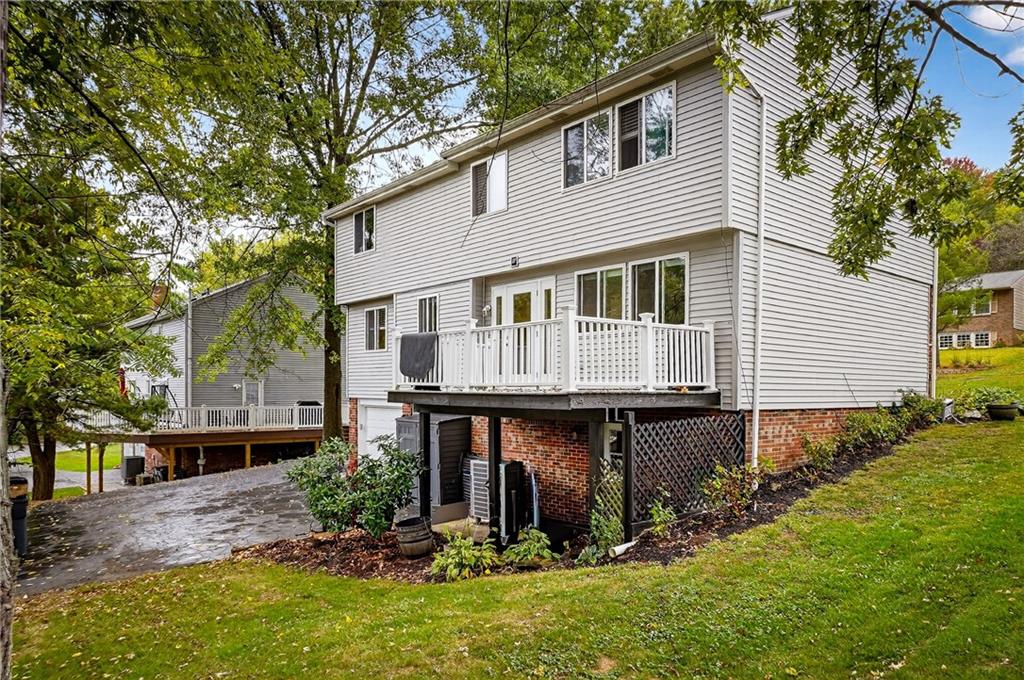 1240 Manor Drive Upper St. Clair, PA 15241 - Photo 22 of 24 a view of house with yard and sitting area
