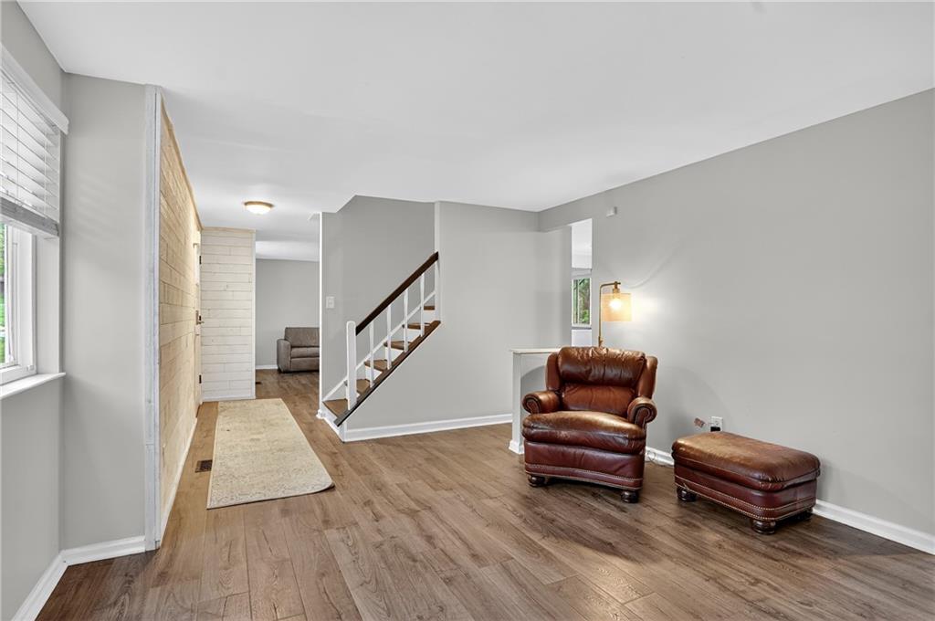 1240 Manor Drive Upper St. Clair, PA 15241 - Photo 3 of 24 a living room with furniture and wooden floor