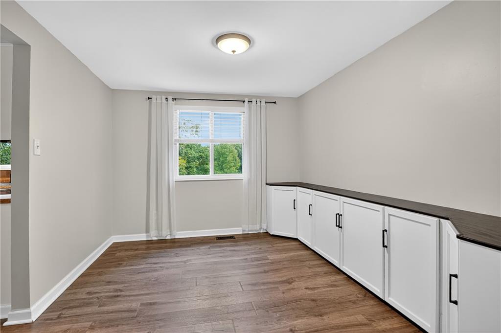 1240 Manor Drive Upper St. Clair, PA 15241 - Photo 5 of 24 a view of an empty room with wooden floor