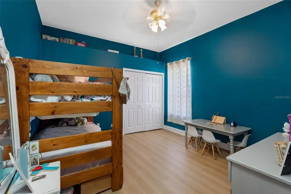 a room with furniture and a window