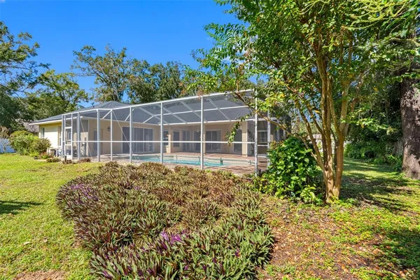 a view of a house with a garden