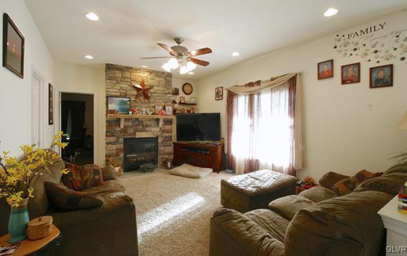 1045 Long Lane Road Kutztown, PA 19530 - Photo 4 of 28 Family room with stone, propane fireplace.