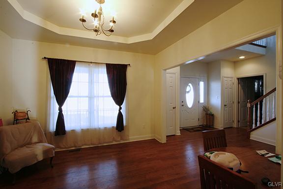 1045 Long Lane Road Kutztown, PA 19530 - Photo 5 of 28 Dining room with tray ceiling and wood flooring.