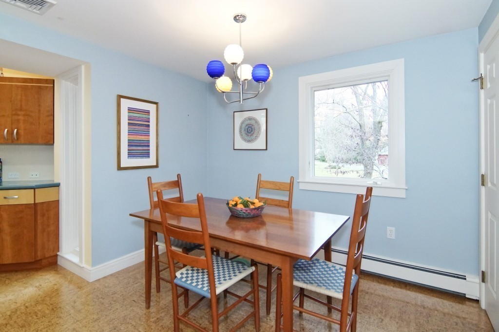 9 Saddle Club Road Lexington, MA 02420 - Photo 8 of 25 a dining room with furniture and window