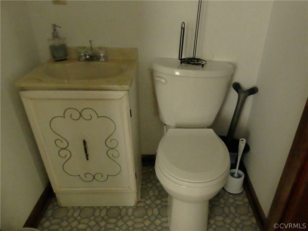 1876 Scotts Bottom Road Dillwyn, VA 23936 - Photo 14 of 30 a bathroom with a toilet and a sink
