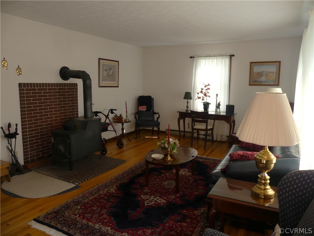 1876 Scotts Bottom Road Dillwyn, VA 23936 - Photo 5 of 30 a living room with furniture rug and a lamp