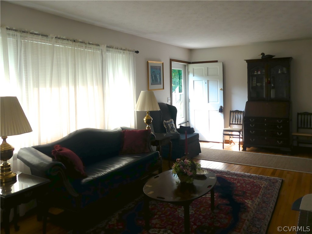 1876 Scotts Bottom Road Dillwyn, VA 23936 - Photo 6 of 30 a living room with furniture and a wooden floor