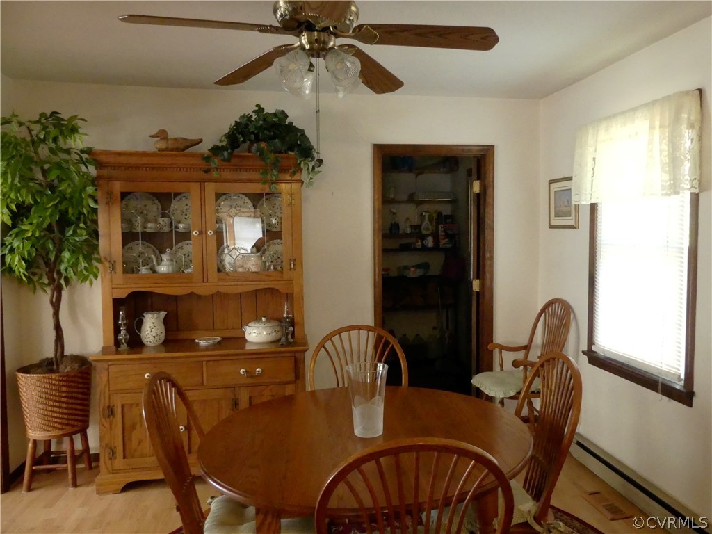 1876 Scotts Bottom Road Dillwyn, VA 23936 - Photo 8 of 30 a view of a dining room with furniture and chandelier